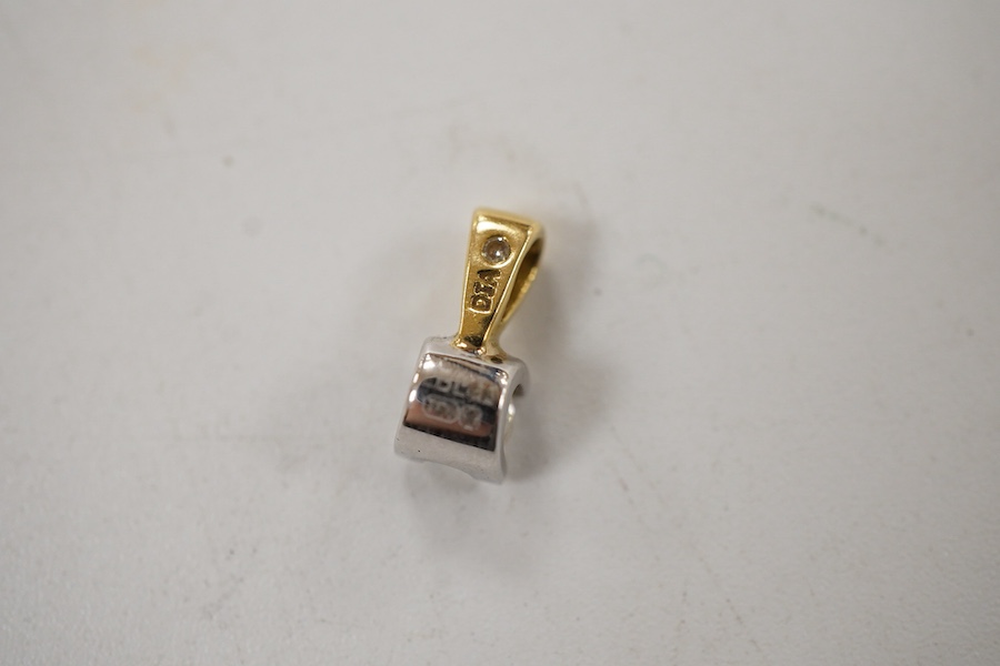 A recent 18ct two colour gold and solitaire diamond set pendant, the stone weighing approx. 0.20ct.